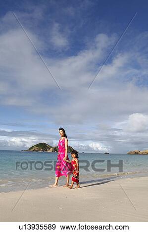 Mother and Daughter Walking on Beach View Large Photo Image Stock Photo - Mother and Daughter Walking on Beach. Fotosearch