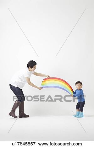 Mother and Son Holding Rainbow View Large Photo Image Stock Photo - Mother and Son Holding Rainbow. Fotosearch