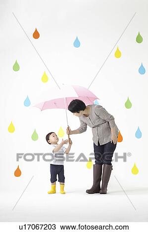 Mother and Son in Rain View Large Photo Image Stock Image - Mother and Son in Rain. Fotosearch