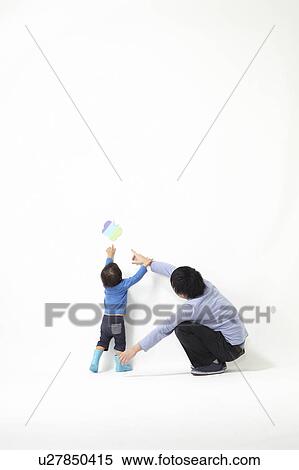 Mother and Son Looking At Butterfly View Large Photo Image Stock Photography - Mother and Son Looking At Butterfly. Fotosearch
