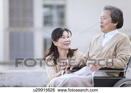 Stock Photograph - Outdoors, Mature Woman, Profile, Mature Couple, Healthcare And Medicine. Fotosearch