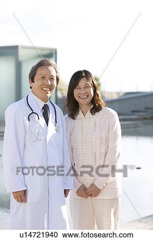 Stock Image - Portrait of Female Patient and Doctor. Fotosearch
