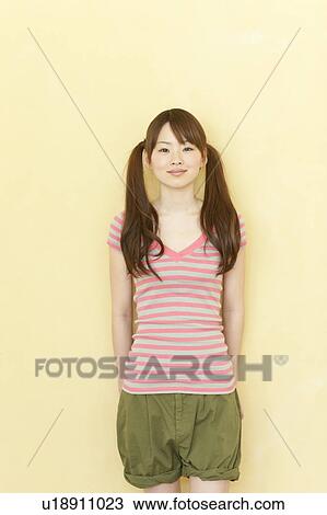 Stock Image - Portrait of Young Woman. Fotosearch