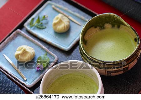 Stock Image - Powdered Green Tea and Kuri Kinton. Fotosearch