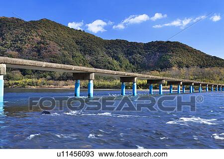 Stock Image - Sada Bridge and Shimanto River. Fotosearch