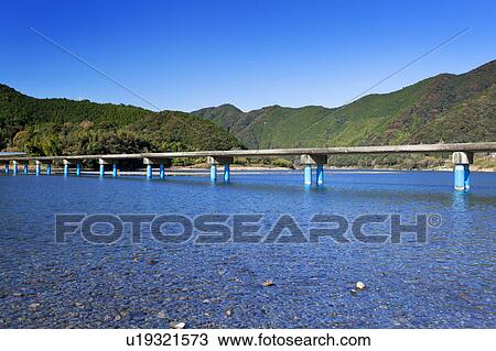 Stock Image - Sada Bridge and Shimanto River. Fotosearch