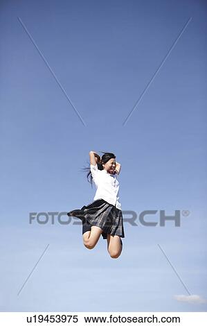Schoolgirl Jumping View Large Photo Image Stock Photography - Schoolgirl Jumping. Fotosearch