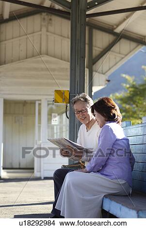 Senior Couple at Rail Station View Large Photo Image Picture - Senior Couple at Rail Station. Fotosearch