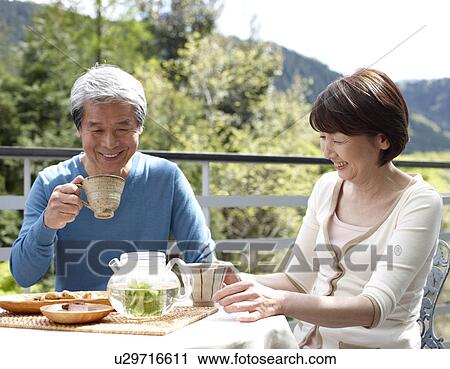 Senior Couple Having Tea at Terrace View Large Photo Image Stock Image - Senior Couple Having Tea at Terrace. Fotosearch