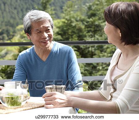 Senior Couple Having Tea at Terrace View Large Photo Image Stock Image - Senior Couple Having Tea at Terrace. Fotosearch