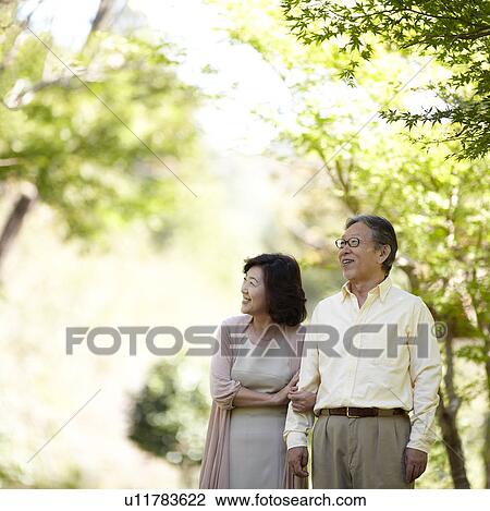 Senior Couple in Park View Large Photo Image Stock Image - Senior Couple in Park. Fotosearch