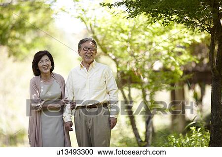 Senior Couple in Park View Large Photo Image Stock Image - Senior Couple in Park. Fotosearch