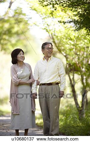 Stock Photo - Senior Couple in Park. Fotosearch