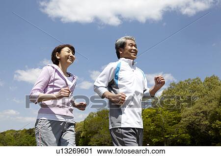Stock Image - Senior Couple Jogging. Fotosearch