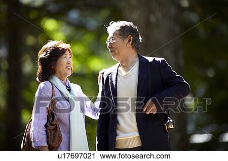 Stock Image - Senior Couple Looking at Each Other. Fotosearch