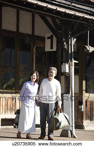 Stock Photography - Senior Couple on Platform. Fotosearch
