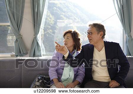 Senior Couple on Train View Large Photo Image Stock Photo - Senior Couple on Train. Fotosearch