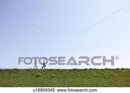 Stock Photo - Senior Couple Running. Fotosearch