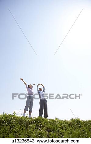 Senior Couple Stretching View Large Photo Image Stock Image - Senior Couple Stretching. Fotosearch