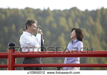Senior Couple Taking Photos View Large Photo Image Stock Image - Senior Couple Taking Photos. Fotosearch