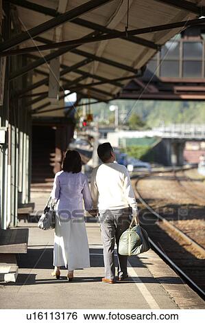 Senior Couple Walking on Platform View Large Photo Image Stock Photograph - Senior Couple Walking on Platform. Fotosearch