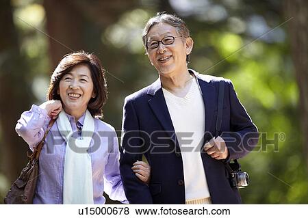 Stock Photo - Senior Couple Walking. Fotosearch