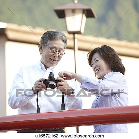 Senior Couple with Camera View Large Photo Image Stock Image - Senior Couple with Camera. Fotosearch