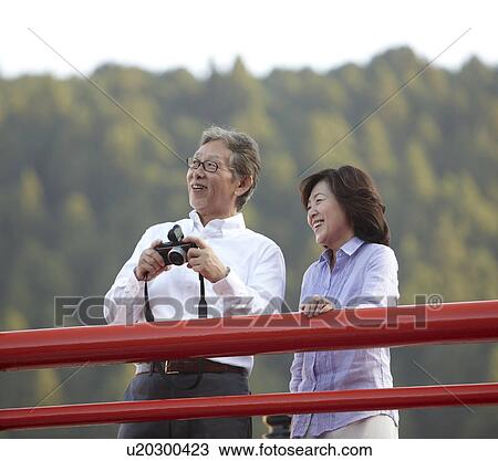 Senior Couple with Camera View Large Photo Image Stock Image - Senior Couple with Camera. Fotosearch