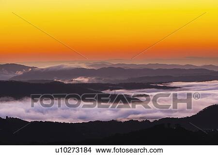 Silhouetted Mountains at Dawn View Large Photo Image Picture - Silhouetted Mountains at Dawn. Fotosearch