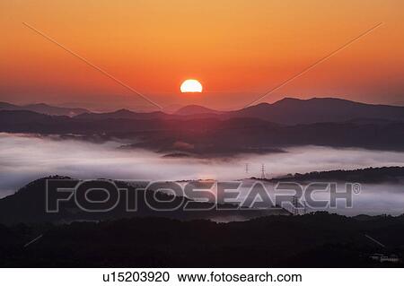 Silhouetted Mountains at Sunrise View Large Photo Image Stock Image - Silhouetted Mountains at Sunrise. Fotosearch