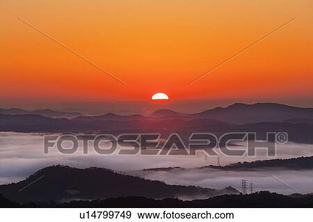 Silhouetted Mountains at Sunrise View Large Photo Image Stock Photo - Silhouetted Mountains at Sunrise. Fotosearch