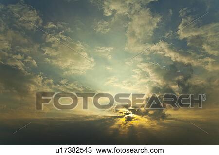Stock Image - Sky and sunbeam. Fotosearch