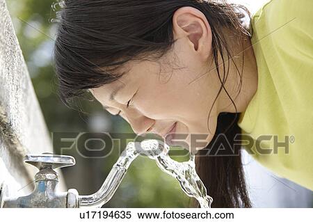 Teenage Girl Drinking From Faucet View Large Photo Image Stock Photography - Teenage Girl Drinking From Faucet. Fotosearch
