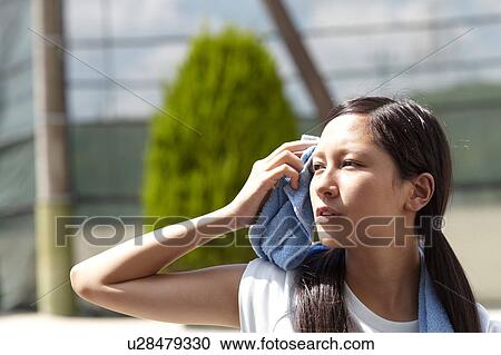 Teenage Girl Wiping Her Face View Large Photo Image Stock Image - Teenage Girl Wiping Her Face. Fotosearch