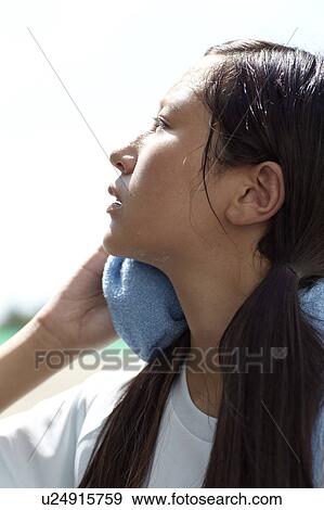 Teenage Girl Wiping Her Face View Large Photo Image Stock Photo - Teenage Girl Wiping Her Face. Fotosearch