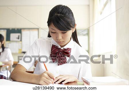 Teenage Girl Writing Classroom View Large Photo Image Stock Image - Teenage Girl Writing Classroom. Fotosearch