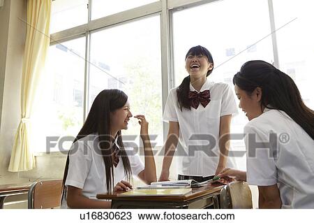 Three Female Students Talking View Large Photo Image Stock Image - Three Female Students Talking. Fotosearch