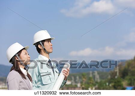 Two Businesspeople at Construction Site View Large Photo Image Stock Image - Two Businesspeople at Construction Site. Fotosearch