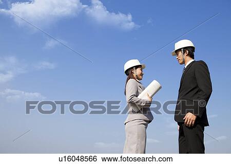 Two Businesspeople at Construction Site View Large Photo Image Stock Photograph - Two Businesspeople at Construction Site. Fotosearch