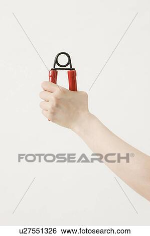 Woman Holding Hand Griper View Large Photo Image Stock Photograph - Woman Holding Hand Griper. Fotosearch