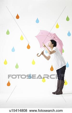 Woman in Colourful Rain View Large Photo Image Stock Photo - Woman in Colourful Rain. Fotosearch