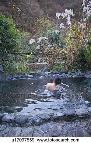 Woman in hot spring View Large Photo Image Stock Photo - Woman in hot spring. Fotosearch
