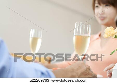 Young couple eating dinner View Large Photo Image Stock Image - Young couple eating dinner. Fotosearch