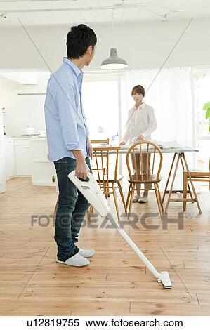 Young couple running chores View Large Photo Image Stock Photography - Young couple running chores. Fotosearch