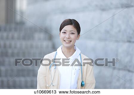 Young Female Nurse View Large Photo Image Stock Image - Young Female Nurse. Fotosearch