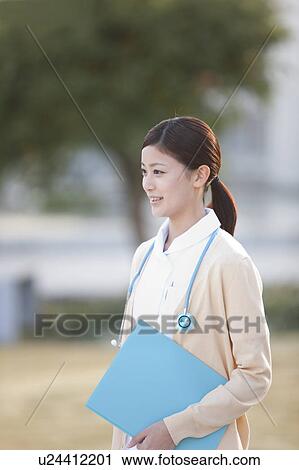 Stock Image - Young Female Nurse. Fotosearch