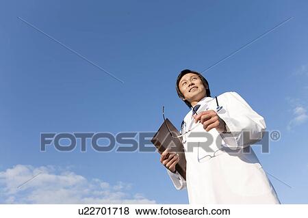 Young Male Doctor View Large Photo Image Stock Photo - Young Male Doctor. Fotosearch