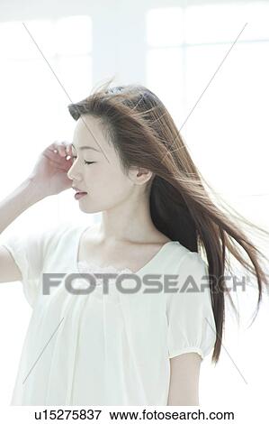 Young woman eyes closed View Large Photo Image Stock Photo - Young woman eyes closed. Fotosearch