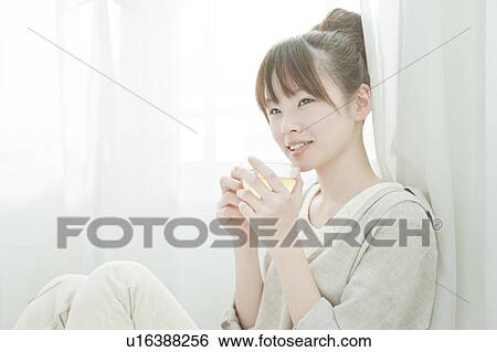 Young Woman Having Tea View Large Photo Image Stock Photograph - Young Woman Having Tea. Fotosearch