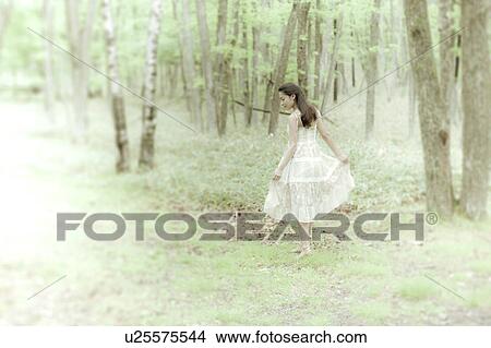 Picture - Young woman in dress. Fotosearch